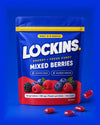 Lockins Mixed Berries pouch with candies on blue